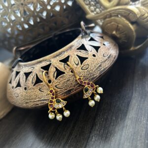 peacock stud